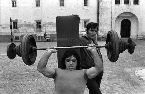 Jean Gaumy. Sports training of prisonners in the walking court. City of Caen. Prison. 1976.