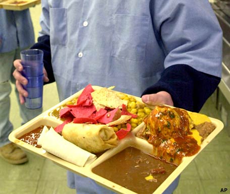 Mmm-mmm-good. An Iowa State Penitentiary inmate shows us what lunch in jail looks like. Credit: Inside America, Jail