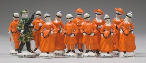Penny Byrne Guantanamo Bay Souvenirs 2007, vintage figurines, metal chains, epoxy resin, plastic, re-touching medium, powder pigments, 14 x 32 x 10 cm.