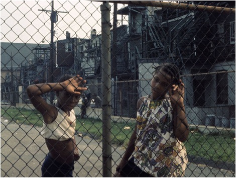 Dad in Prison © Jacob Holdt. Alphonso has often entertained my college students about how he and the other criminals in Baltimore planned to mug me when they first saw me in their ghetto. However, we became good friends, but some time later he got a 6 year prison term. Here are the daughters Alfrida and Joann seen when they told me about it at my return. Today Alphonso has found God with the help of these two daughters who are now both ministers.