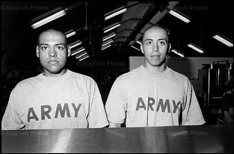 CUBA. Guantanamo Bay. 2003. Soldiers wait for their meals before a prayer breakfast at Camp America. Photo: Bruce Gilden/Magnum
