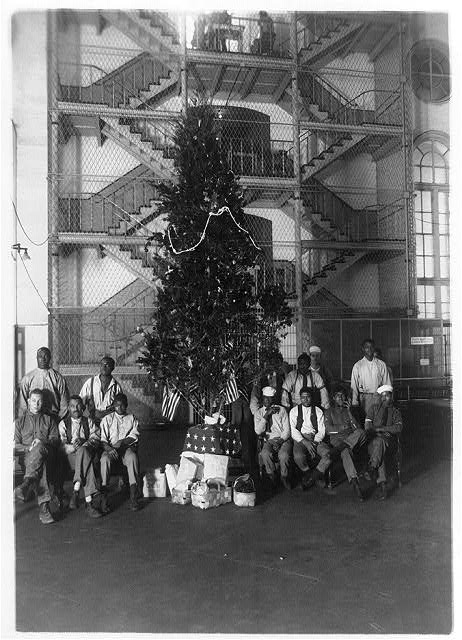 Christmas tree at the District Jail, Washington, D.C. and some of the prisoners (circa 1909-1932). National Photo Company Collection, Library of Congress. # LOT 12342-9