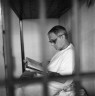 Don Jordan Reads the Bible in his Cell, Louisiana State Penitent
