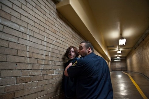 A Corrections Officer forcibly restrains an unruly prisoner who was screaming and claiming abuse by the officer. © Peter Van Agtmael, 2011