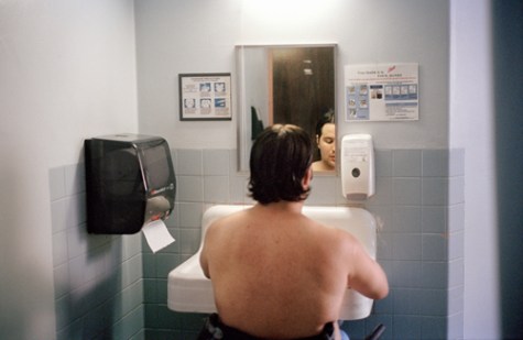 Armand getting ready for the day inside of Goldwater Hospital, March 2012.