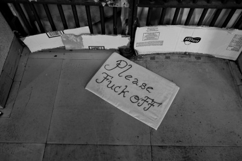 Sign left outside recently vacated cell, Upper E