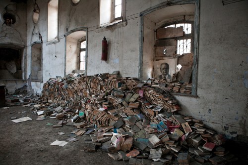 Untitled (Quba). 2011 Soviet era books are collected to trash in a former library in Quba. The alphabet in the country was changed from Cyrillic to Turkish after the independence and history of the country is now being re-writen, thus most of Soviet books became not needed. Azerbaijan. 2011