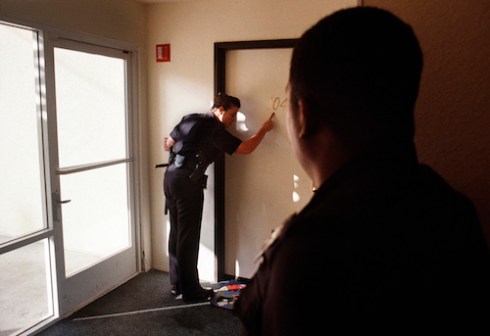 Officers responding to a domestic violence call.